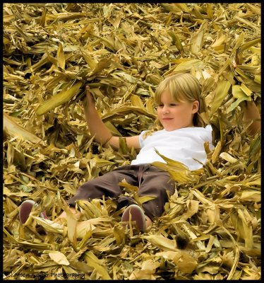 Playing in the corn husks