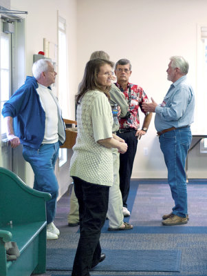 GROUP STANDING BY DOOR