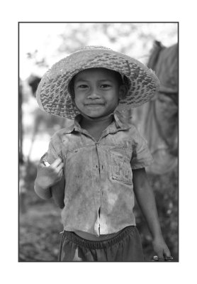 Boy in hat, Cambodian countryside