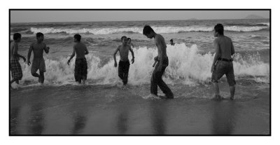 Boys in surf, Hoi An