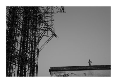 Under the advertising hoardings, Western Expressway