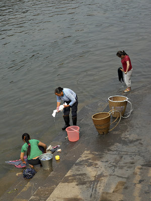 Feng Huang Ancient Town - Washing by the Riverside