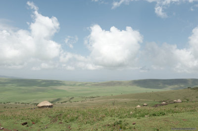 A maasai village, with Serengeti on the background