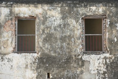 Two windows with red bars