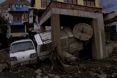 Ladakh-flood. Cars smashed into a prayer wheel