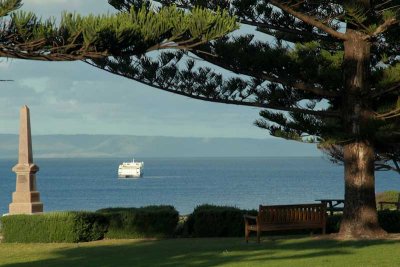 The ferry loiters off shore until time to leave