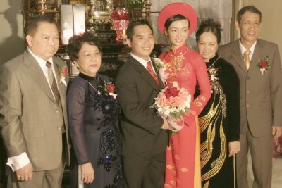 Bride and groom with families.