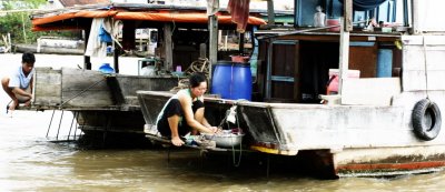 washing clothes in the mekong.jpg