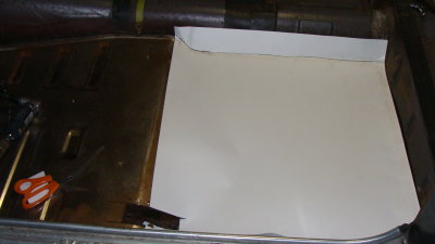 Making a template for the left rear floor pan out of poster board