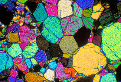 Photomicrograph of peridotite in thin section X10