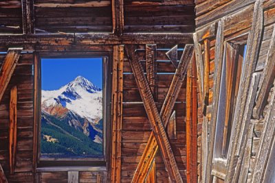 Mt Wilson through an abandoned mining building window, Alta, CO