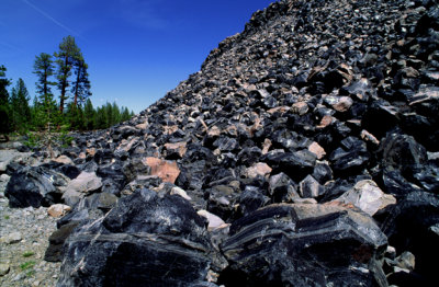 (IG53) Obsidian blocks at the base of a volcanic dome, CA