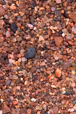  Iron coated quartz and K-feldspar comprise most of this beach  sand along the Lake Superior shoreline, Presque Isle, MI
