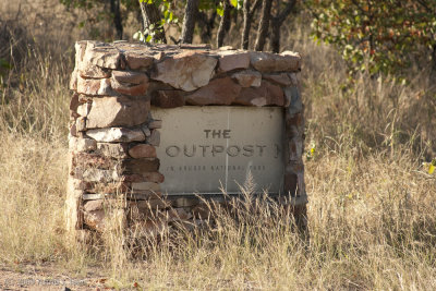 Sign marking the road to the Outpost