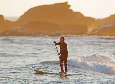 Mavericks Sunset With Paddlesurfer