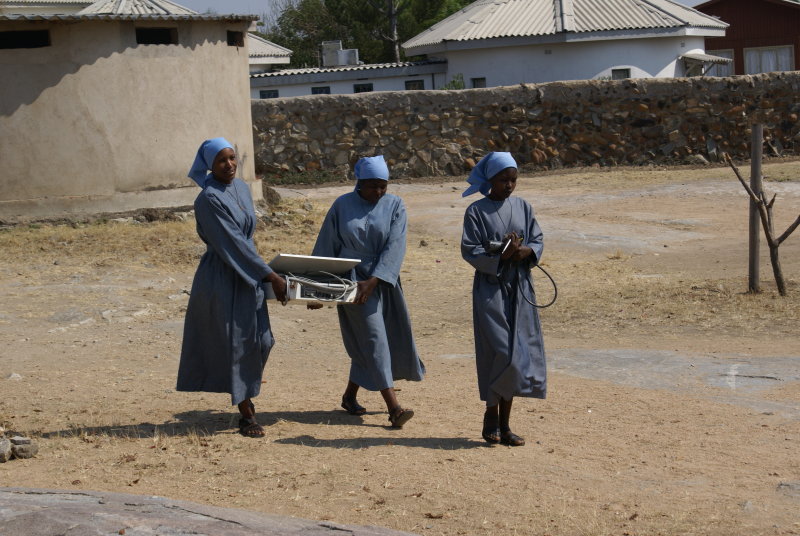 24 Carrying the controller unit into church.jpg