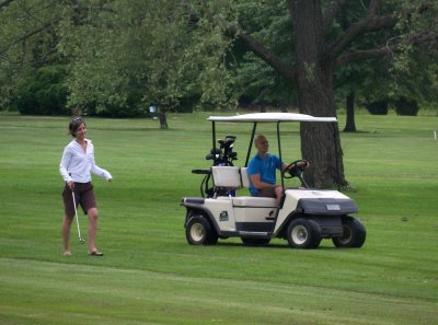 Alison and Warz golfing in Rochester