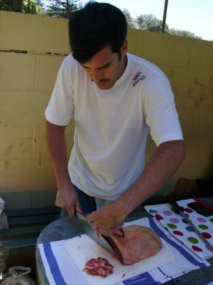 Rafael cutting up Brazilian steak