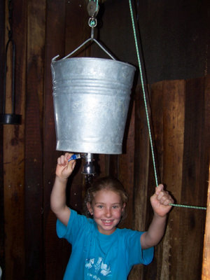 Paula with bucket shower