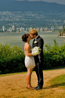 A kiss against the Vancouver skyline