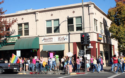 Rally passes Duffy's on Main Street in Chico