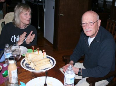 Jan set to blow out the candles on his birthday tamales