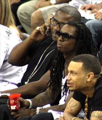 Rap star Lil Wayne (center) also in the house