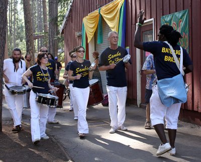 Samba Da Terra, from Sacramento, leads the parade