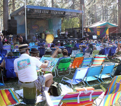 Artist capturing the Meadow Stage scene