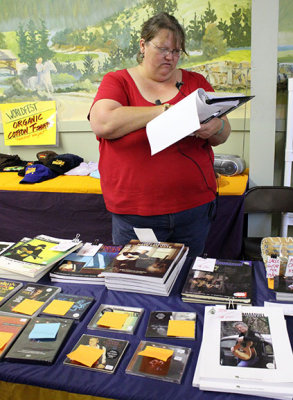 Donna checks in Tommy Emmanuel merchandise