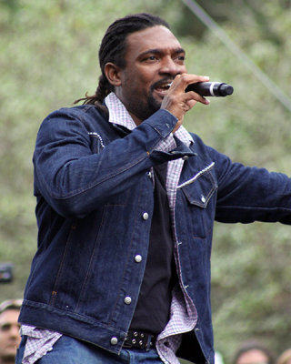 Sly and Robbie guest vocalist. Can someone ID this fellow for me?