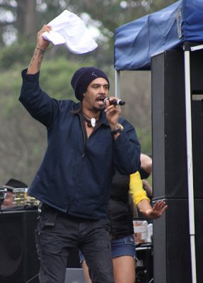 Michael Franti urges the crowd to rise