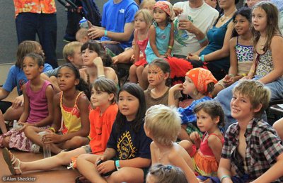 Children gathered up-front to see Professor Merloch Silvermaine, Discovery Stage