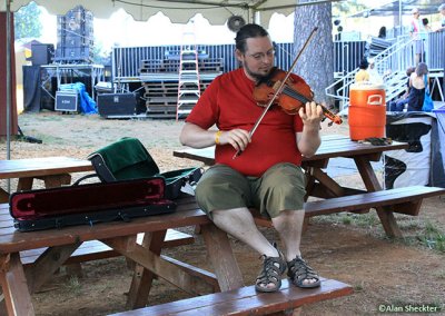 Pascal Gemme of Genticorum warms up for his group's Spotlite Stage set