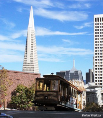 Cable car and Transamerica Pyramid building at California Street