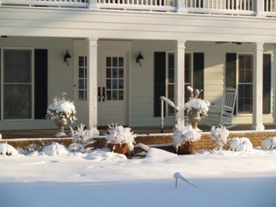 House - snow  on porch