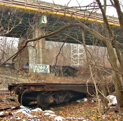 Near the river, an abandoned flatcar