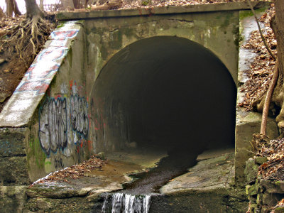Outlet closeup, showing almost-hidden graffiti