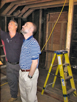 Ned and Bruce looking at some of the ceiling and rafters