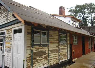 Dormer windows are done, some paint is scraped