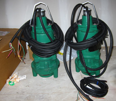 The Grinder Pumps, each nearly 3 ft high