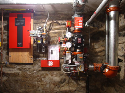 In the basement, pipes & controls for the fire suppression system