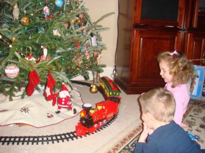 playing with their new mickey train from nana