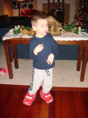 singing and dancing in his cars slippers