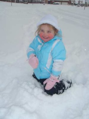 lilly bit had fun eating snow