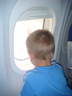 he loved looking out the plane, asking a hundred questions