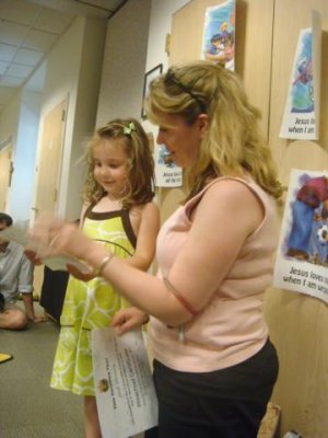 e's teacher was giving her a certificate and telling her how much she enjoyed her