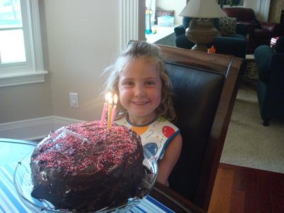 so excited to blow out her four candles