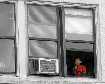 Red Boy In Window