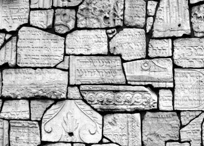 Remuh, wall of broken tombstones